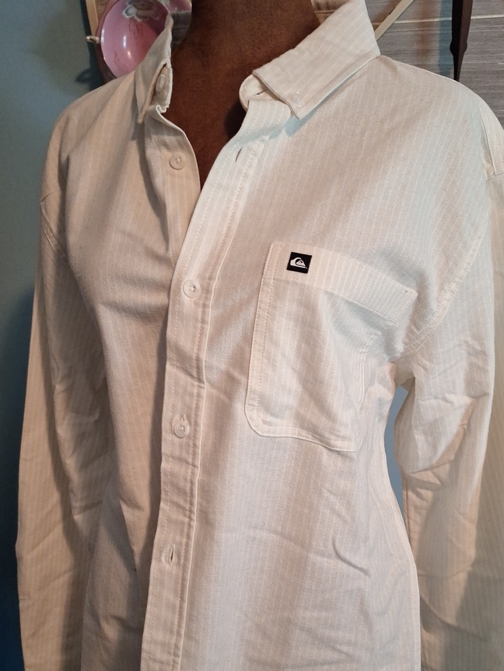 Quiksilver Beige Button-Down Shirt with Black Tag and Red Logo